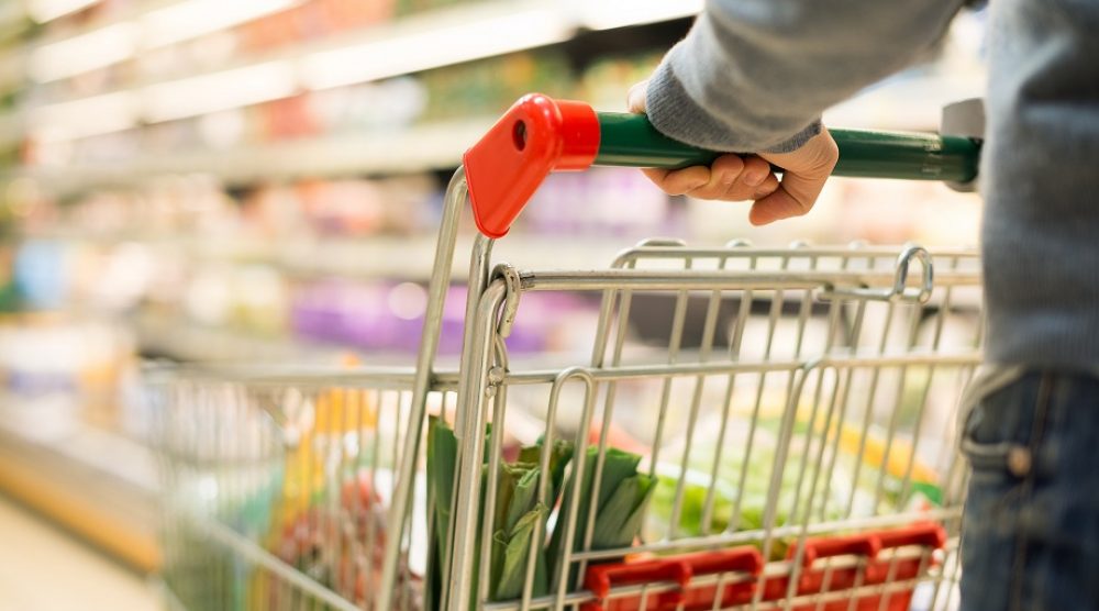 Close-up detail of a man shopping in a supermarket